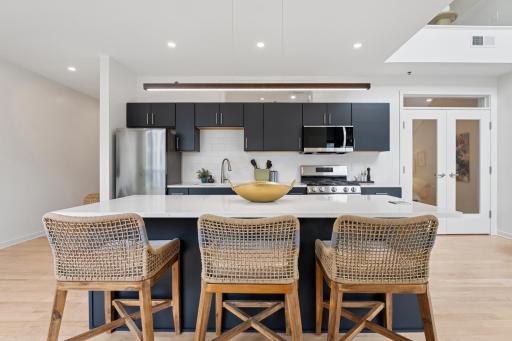 Custom cabinetry adds elegance and smart storage solutions, making everything feel polished and clutter-free.
