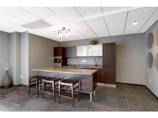 The party room’s full kitchen makes entertaining a breeze, with modern appliances and plenty of prep space for everything from casual potlucks to catered celebrations.