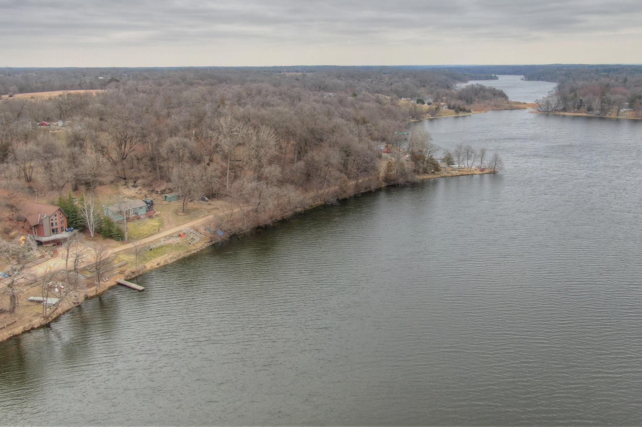 Lake Louisa at 192 acres with great fishing and is connected to 145 acre Lake Marie through a channel giving you 337+ acres to explore and enjoy! This view is looking East towards the channel that takes you to Lake Marie.