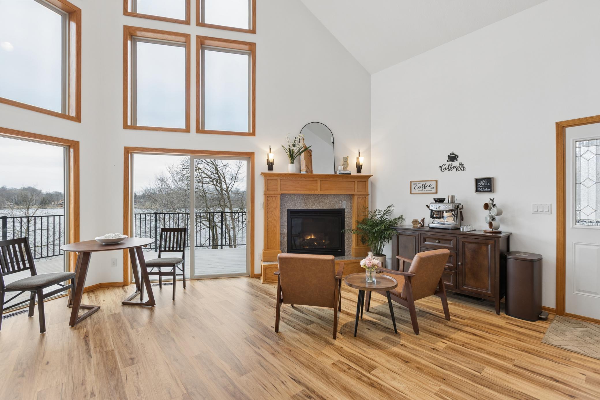 The gas fireplace is perfect for those chilly evenings as you unwind and look out over Lake Louisa. Schedule your private showing of this great property today!