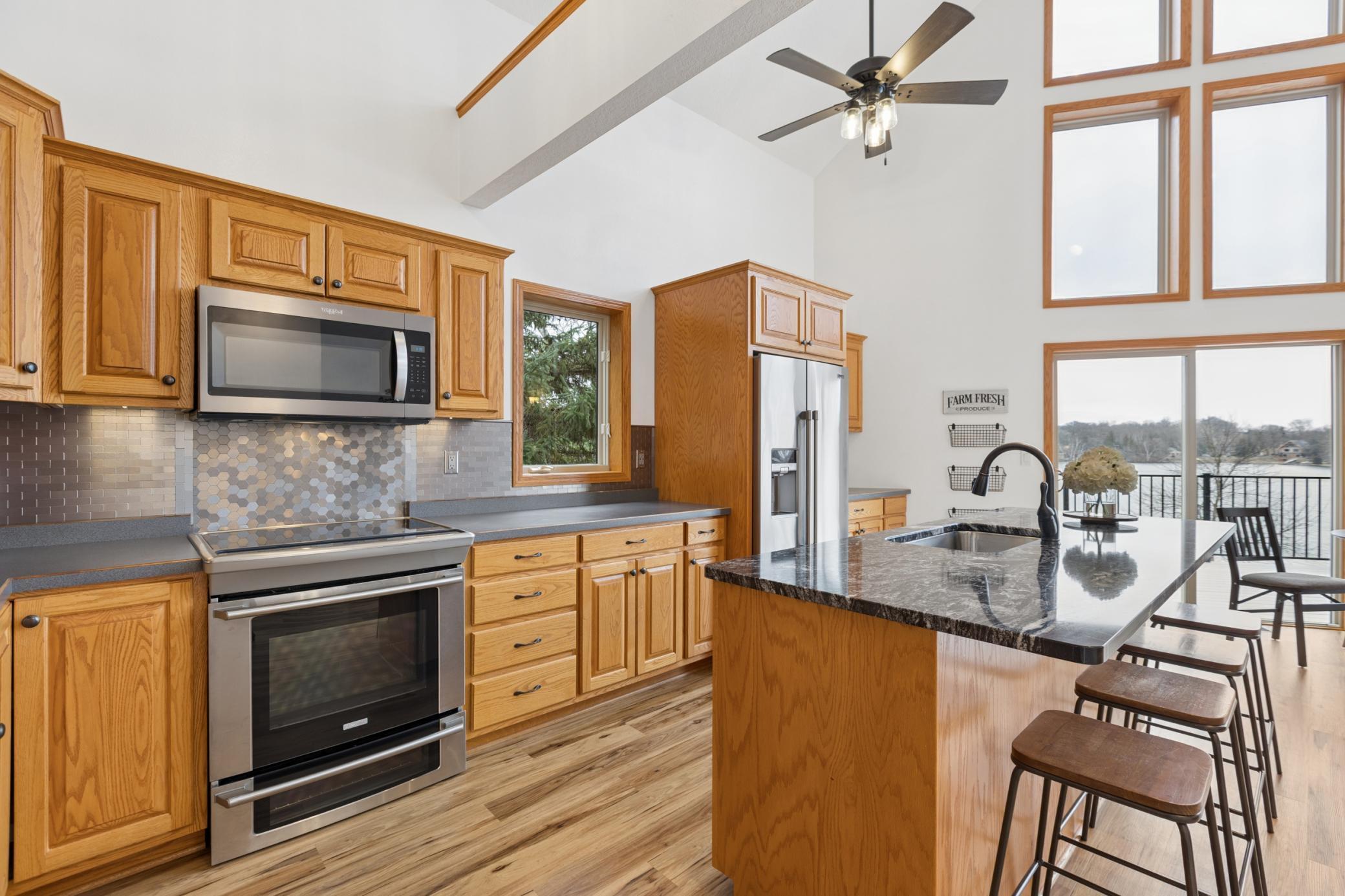 The open design of this home allows everyone to gather together from the kitchen to the informal dining room and into the main floor living room. The pride of ownership is apparent everywhere you throughout this home.