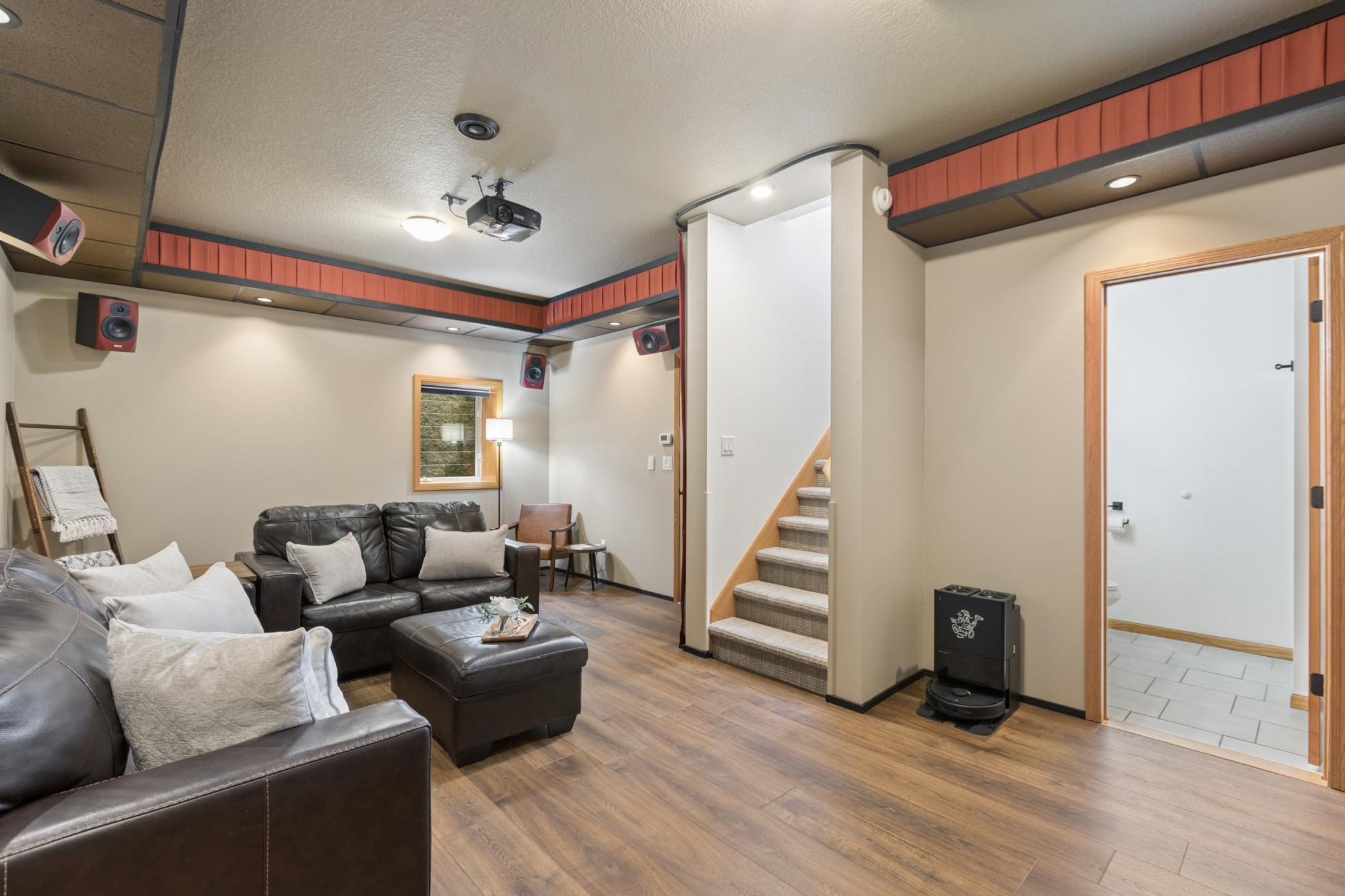 The lower level media room has surround sound speakers and is ready for you to enjoy a movie night or the big game!