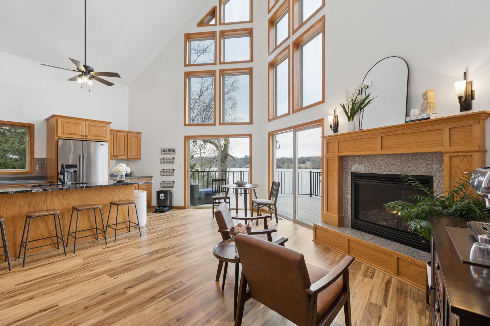 The open design of this custom-built home offers a space for everyone to gather together with phenomenal views out to the lake from throughout the main floor and upper level of the home. Each level of this home has in-floor heat.