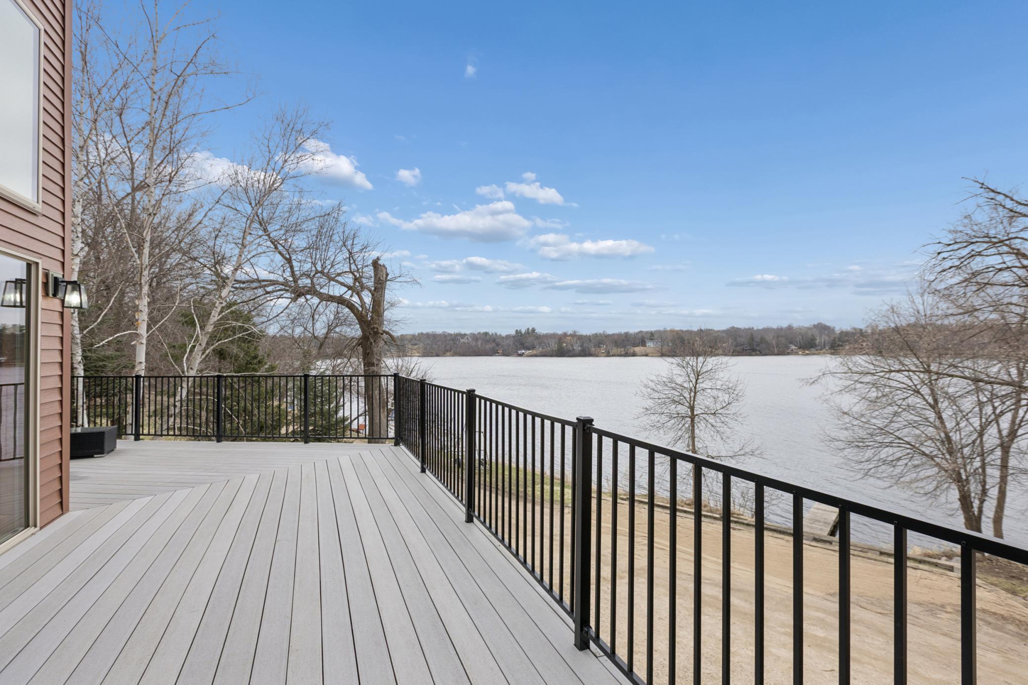 With southern exposure you will enjoy relaxing or entertaining on the wrap around lakeside deck. Lake Louisa is a quiet 192 acre lake with great fishing and is connected to 145 acre Lake Marie through a channel giving you 337+ acres to enjoy!