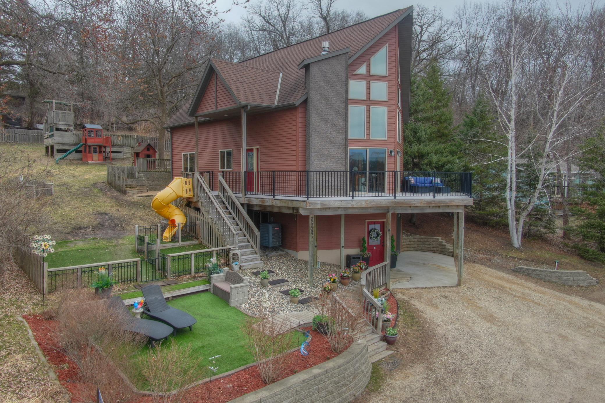 Welcome to Lake Louisa on Aspenwood Court where you will find this custom built home with 75 feet of shoreline with southern exposure. Whether you are looking for a full time residence or a weekend getaway on the lake this is one you have to see.