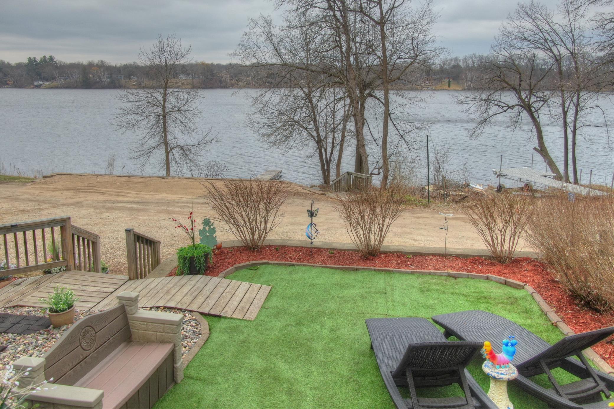 As you walk up to the house you will appreciate the numerous sitting areas overlooking Lake Louisa and the slow sloping lot down to the lake. The full septic with drain field has already been compliance inspected and passed.
