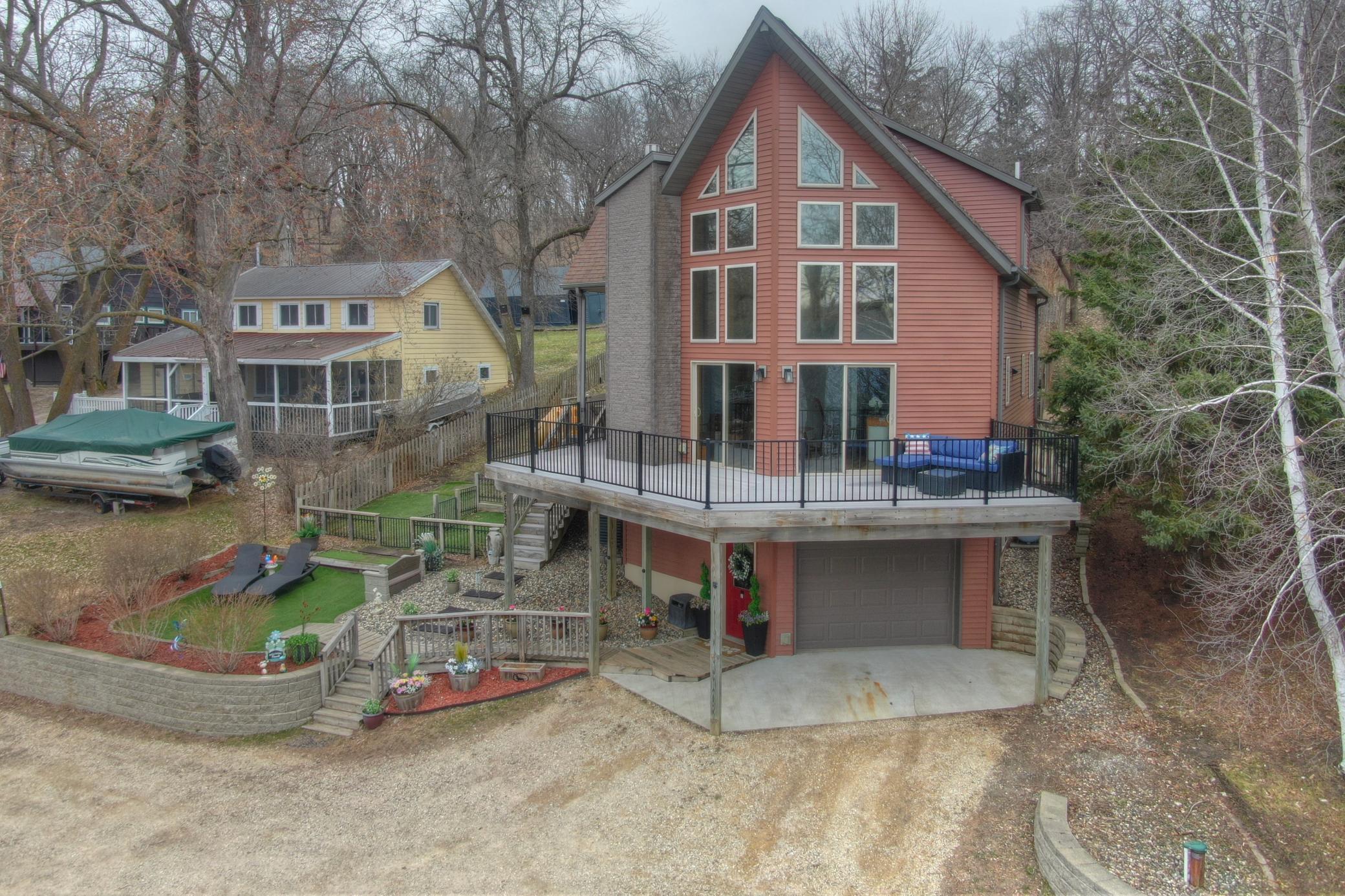 The lower level of the home features an oversized one stall garage that was previously used as living space. Each of the three levels has in-floor heat. Furnace, AC/Heat pump and boiler were replaced in 2021.