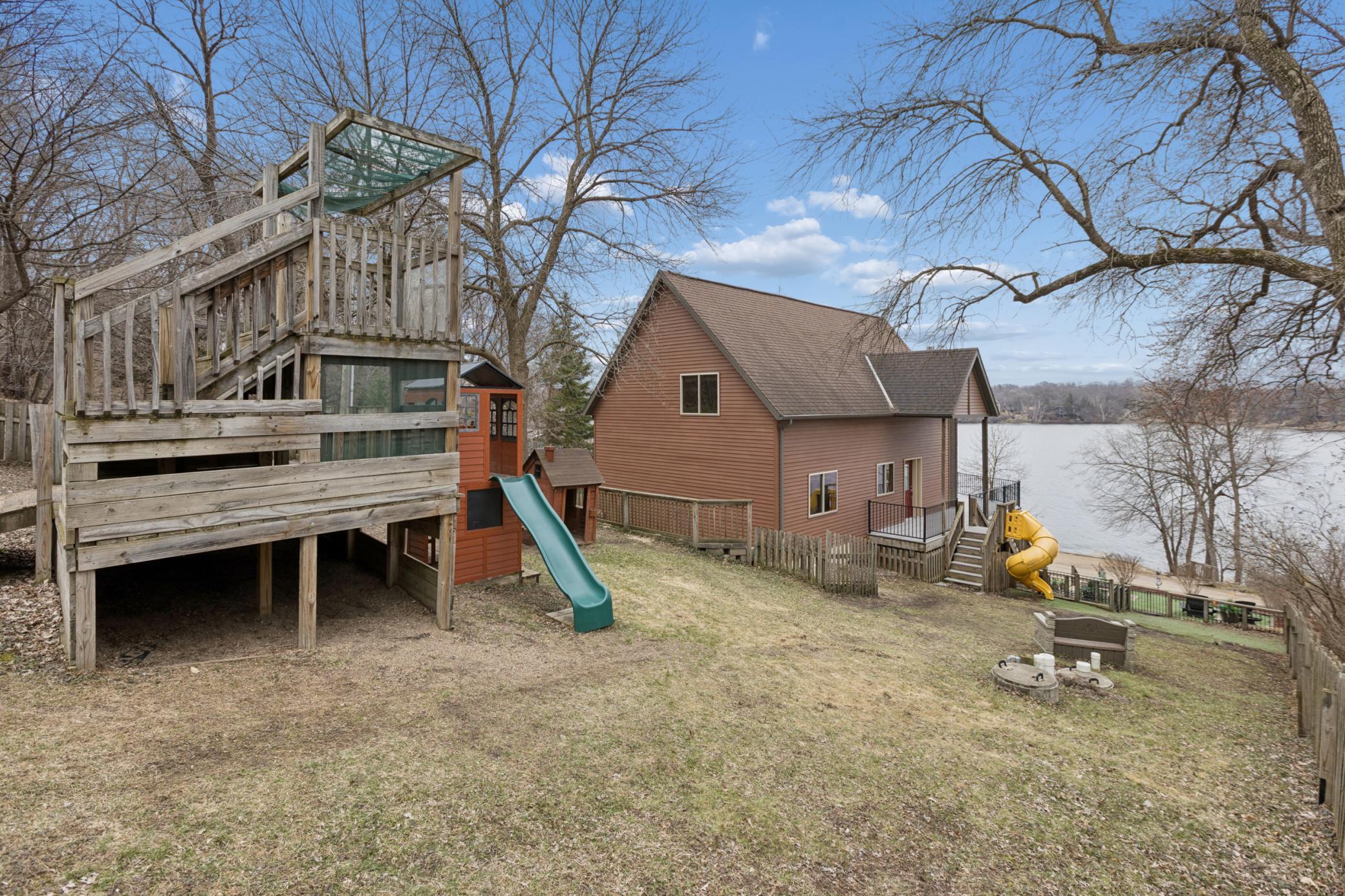 The expansive back yard is the perfect spot to play with the playground already set up and waiting!