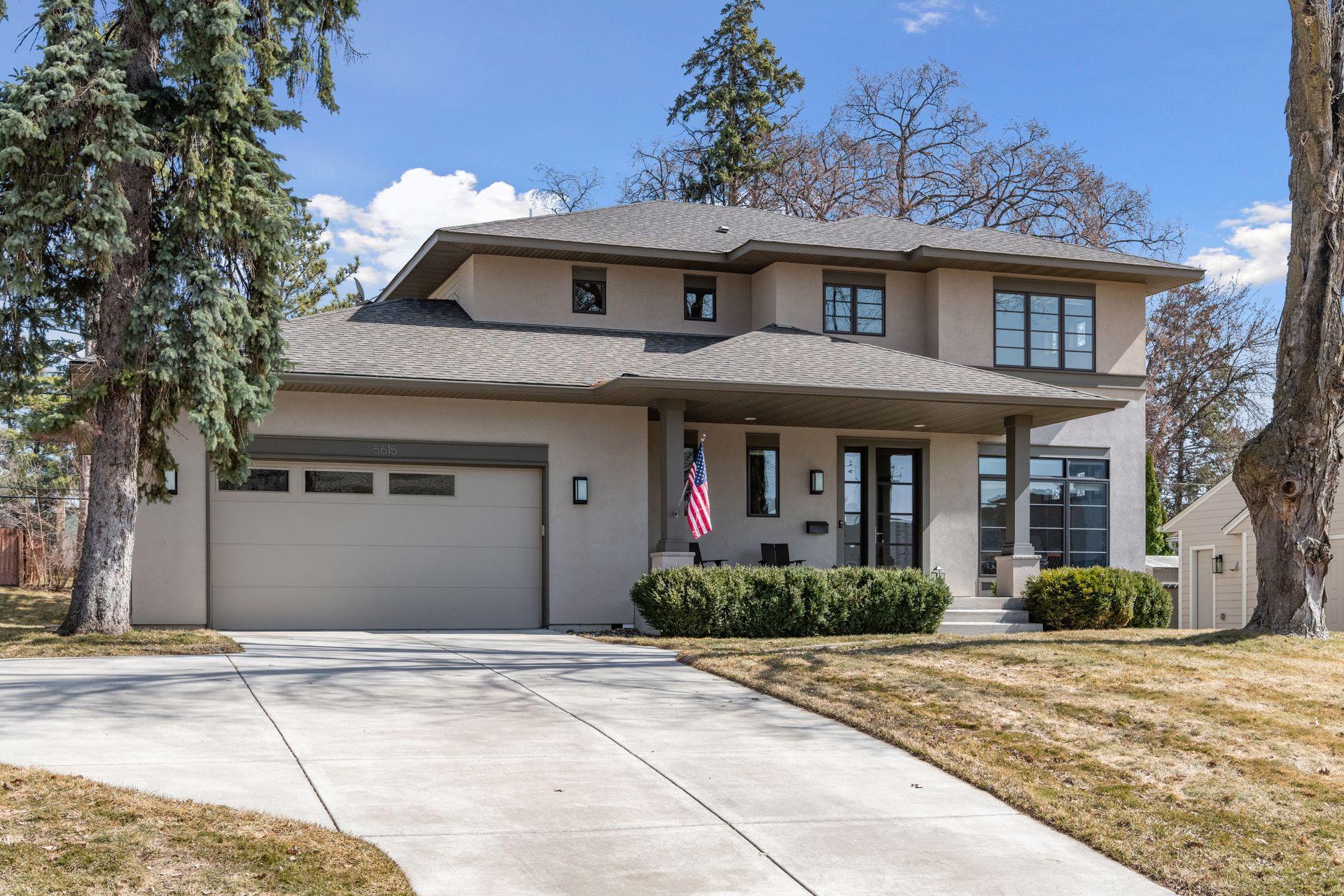 Refined Modern Design. Social space on the front porch. Extra parking in the driveway