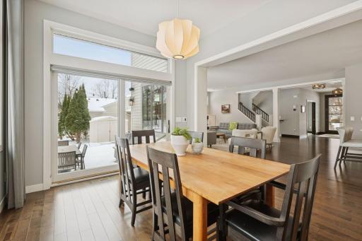 A dining room in a room filled with glass