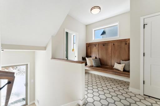 Large mudroom just steps away from the backyard.
