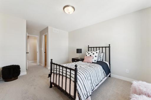 Bedroom 2 boasts a walk-in closet.