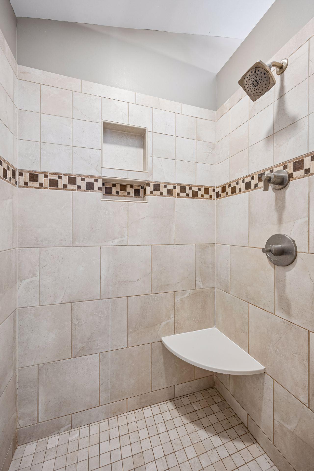 Walk-in shower in primary bathroom