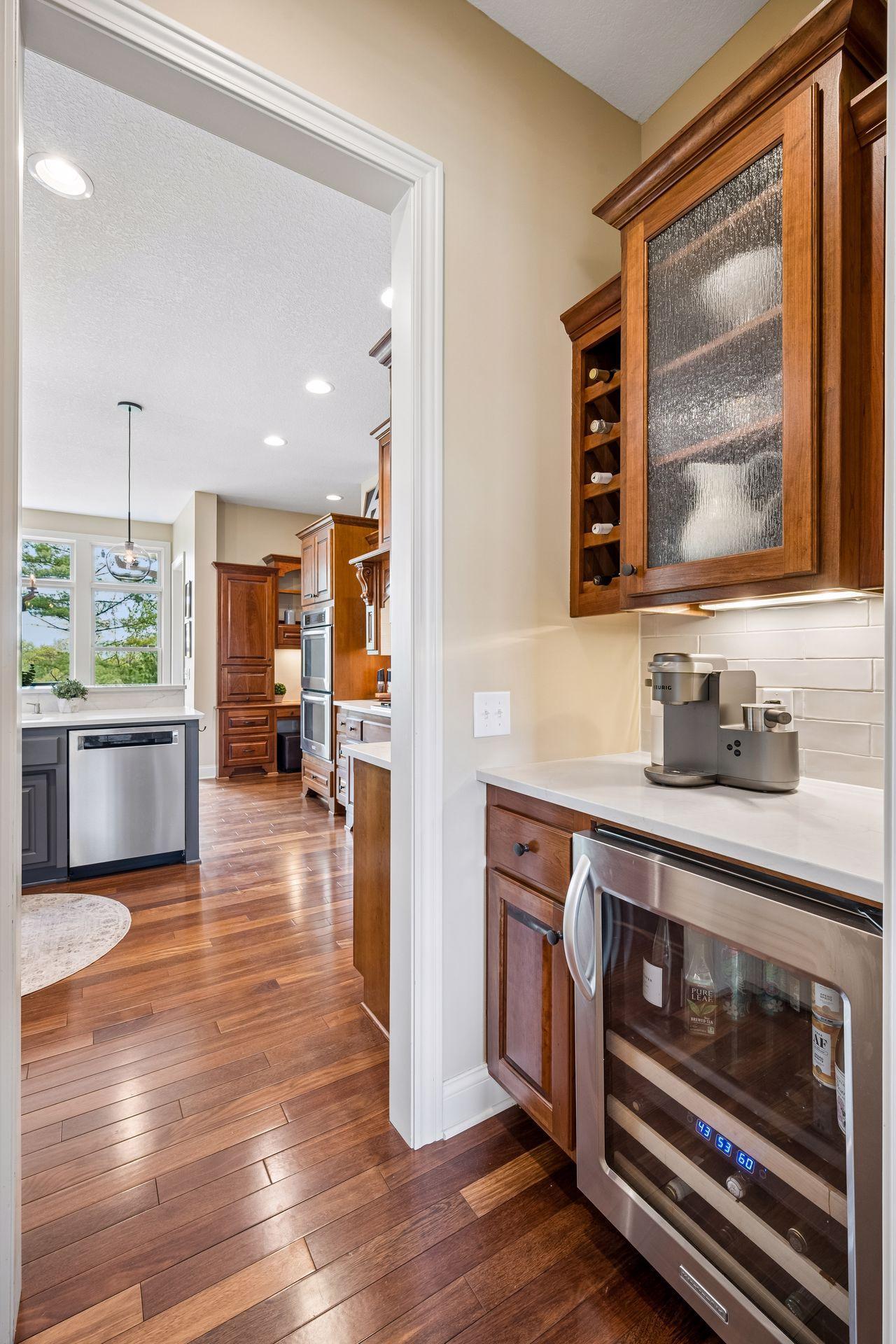 Butler's pantry with walk-in pantry for additional storage
