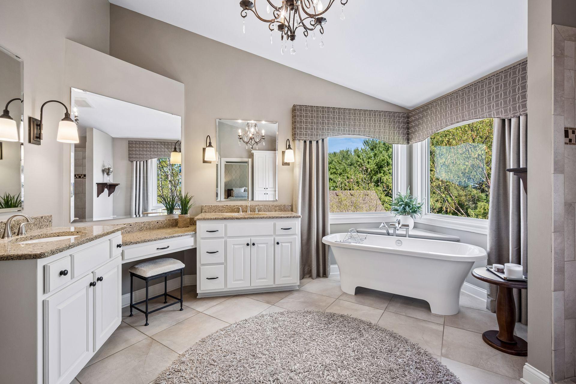Huge luxurious primary bathroom vaulted ceiling