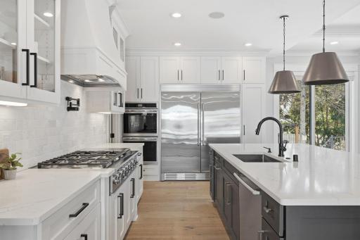 Chefâs kitchen with high end appliances.