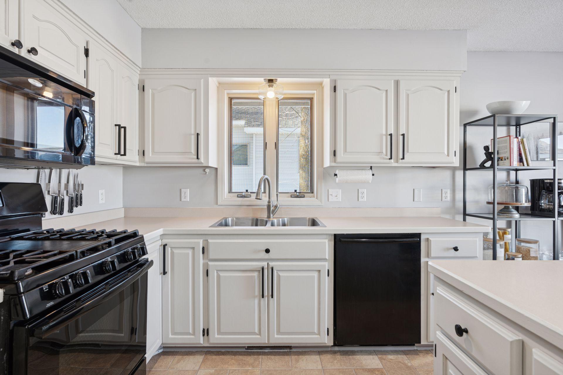 Upgraded appliances featuring a gas range.