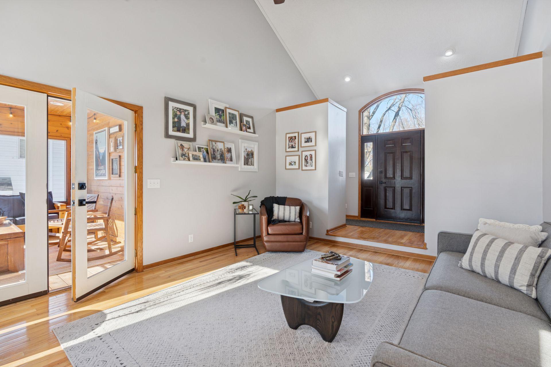 Just off the living area is a great screened porch that walks out to an oversized patio/landscaped area.