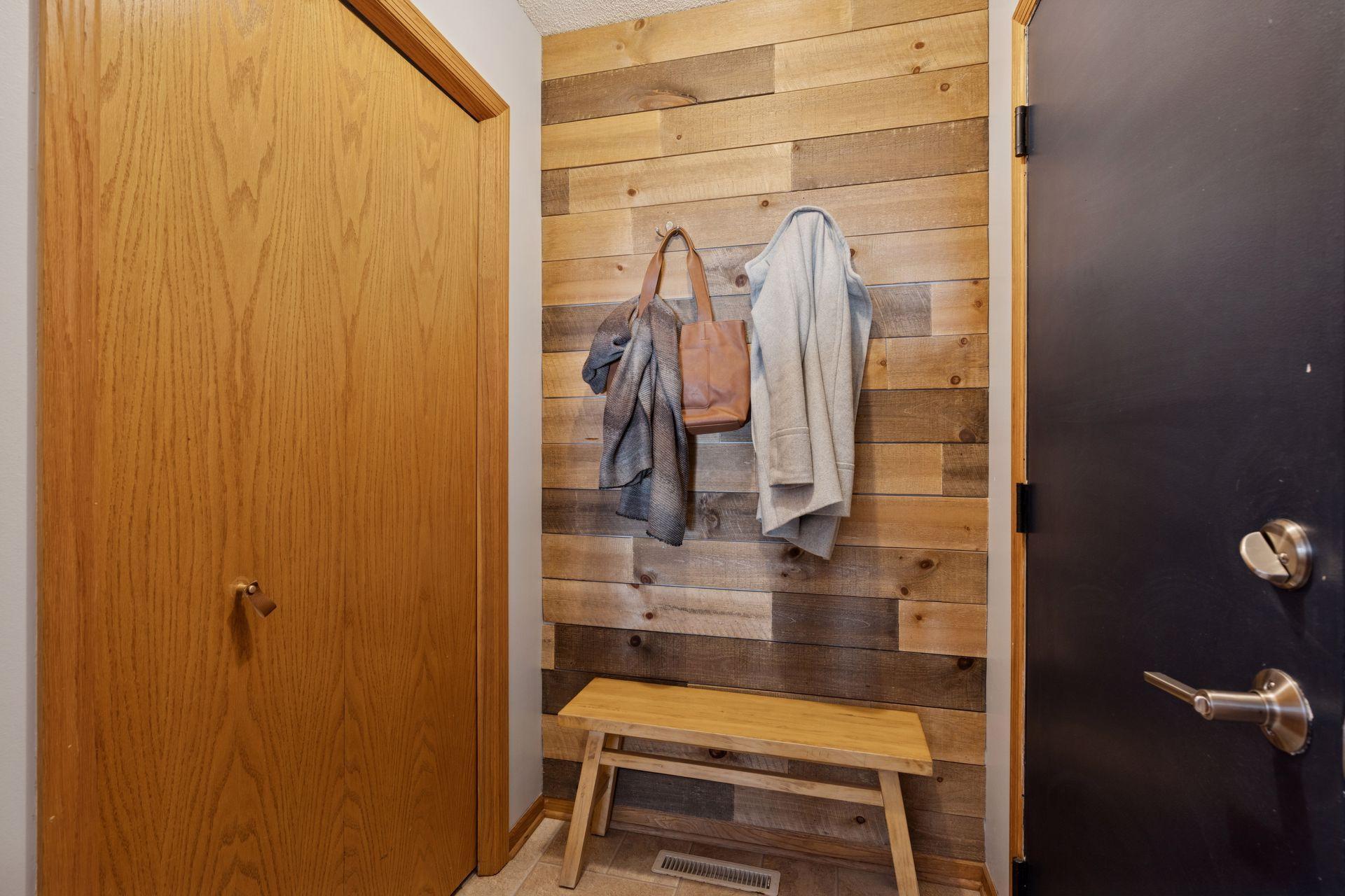 Back entry just off the heated garage features a large closet.