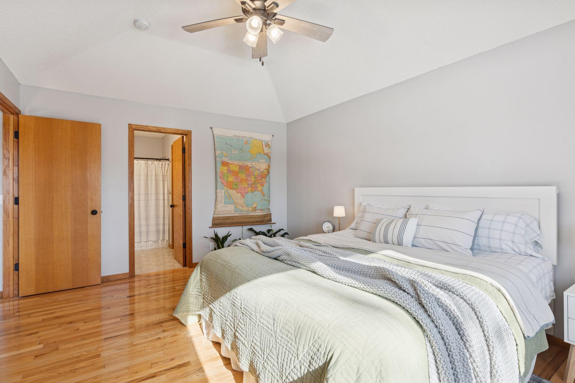 View of the oversized and vaulted primary suite.