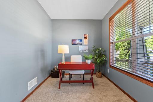 Office or playroom overlooks the front porch