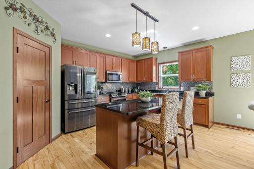 The kitchen features a walk in pantry, induction oven and smart refrigerator