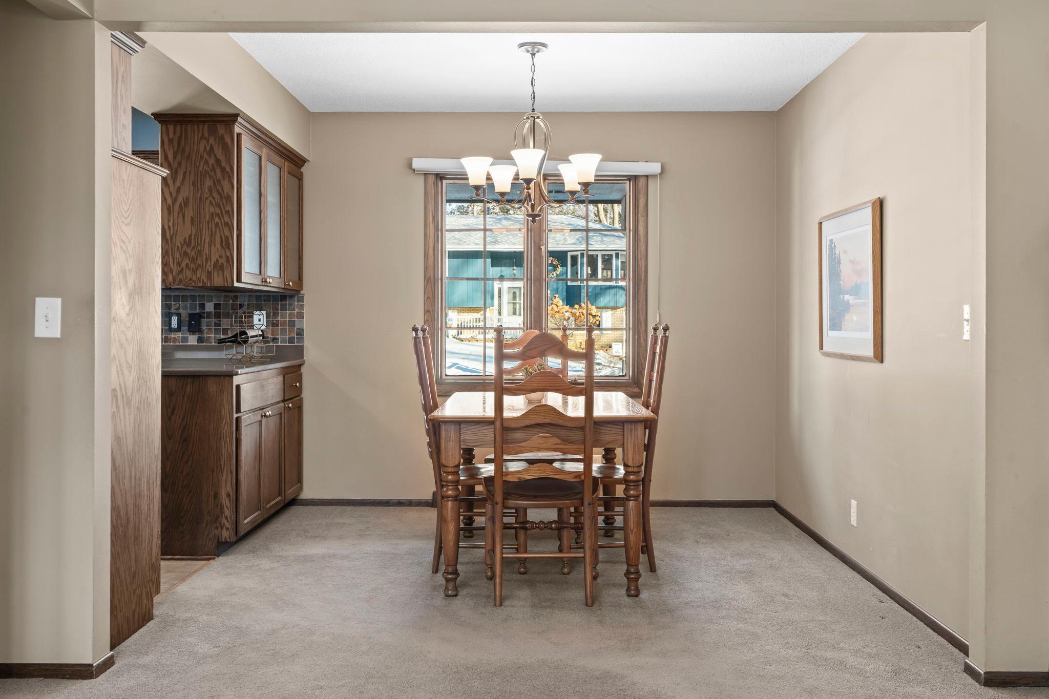 Informal dining with large window.