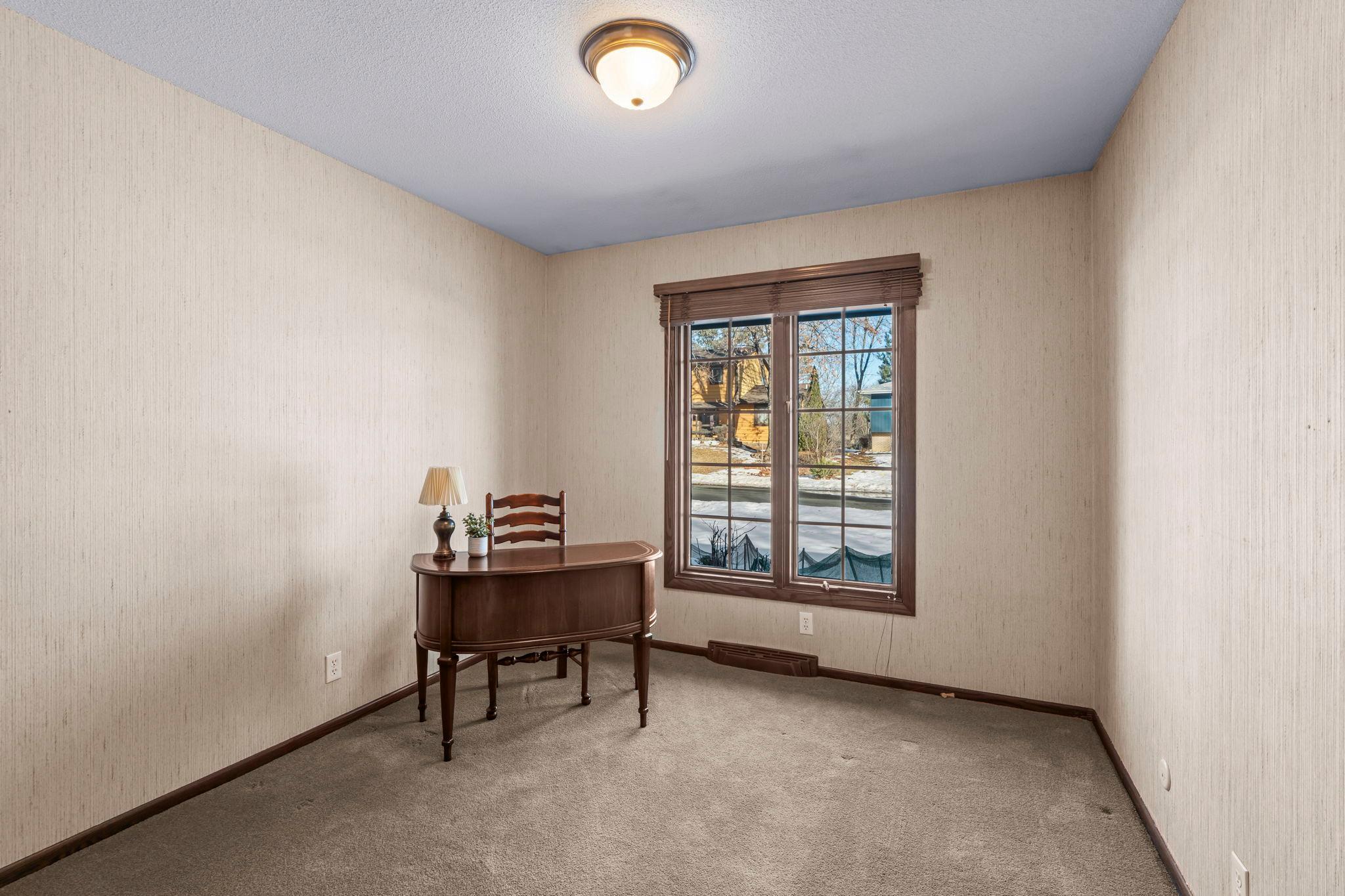 3 bedrooms on the main level feature large windows.