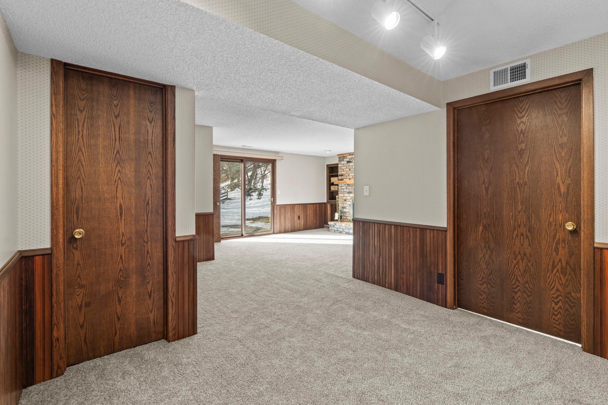 Beautiful natural woodwork and new, neutral carpeting in the lower level.