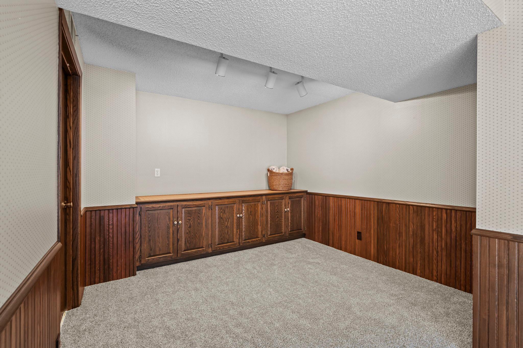 A perfect flex space for office, gaming area, exercise space. Bring your ideas to fill this amazing space with custom built-in storage.