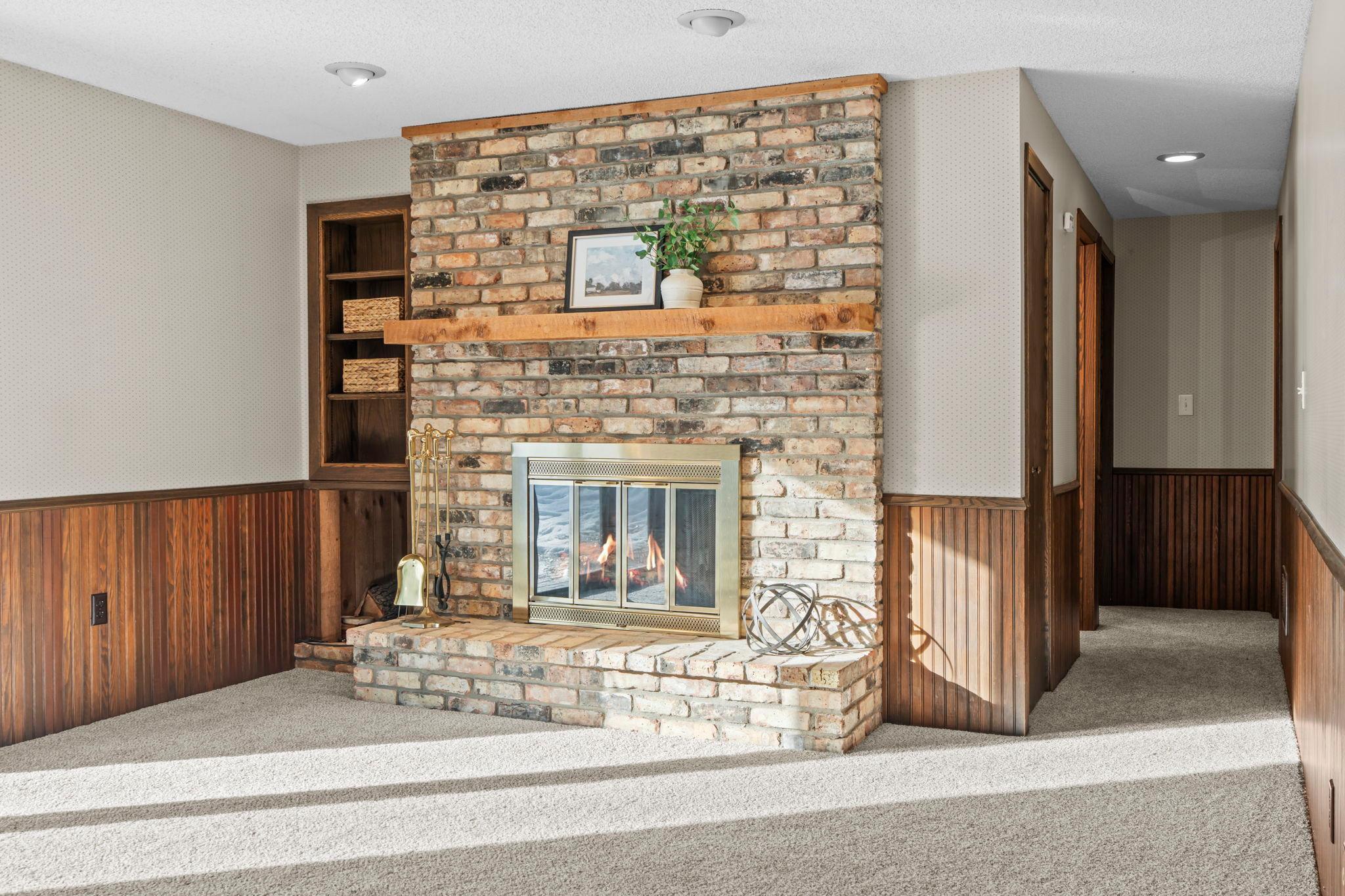 2nd brick wood-burning fireplace in the lower level.