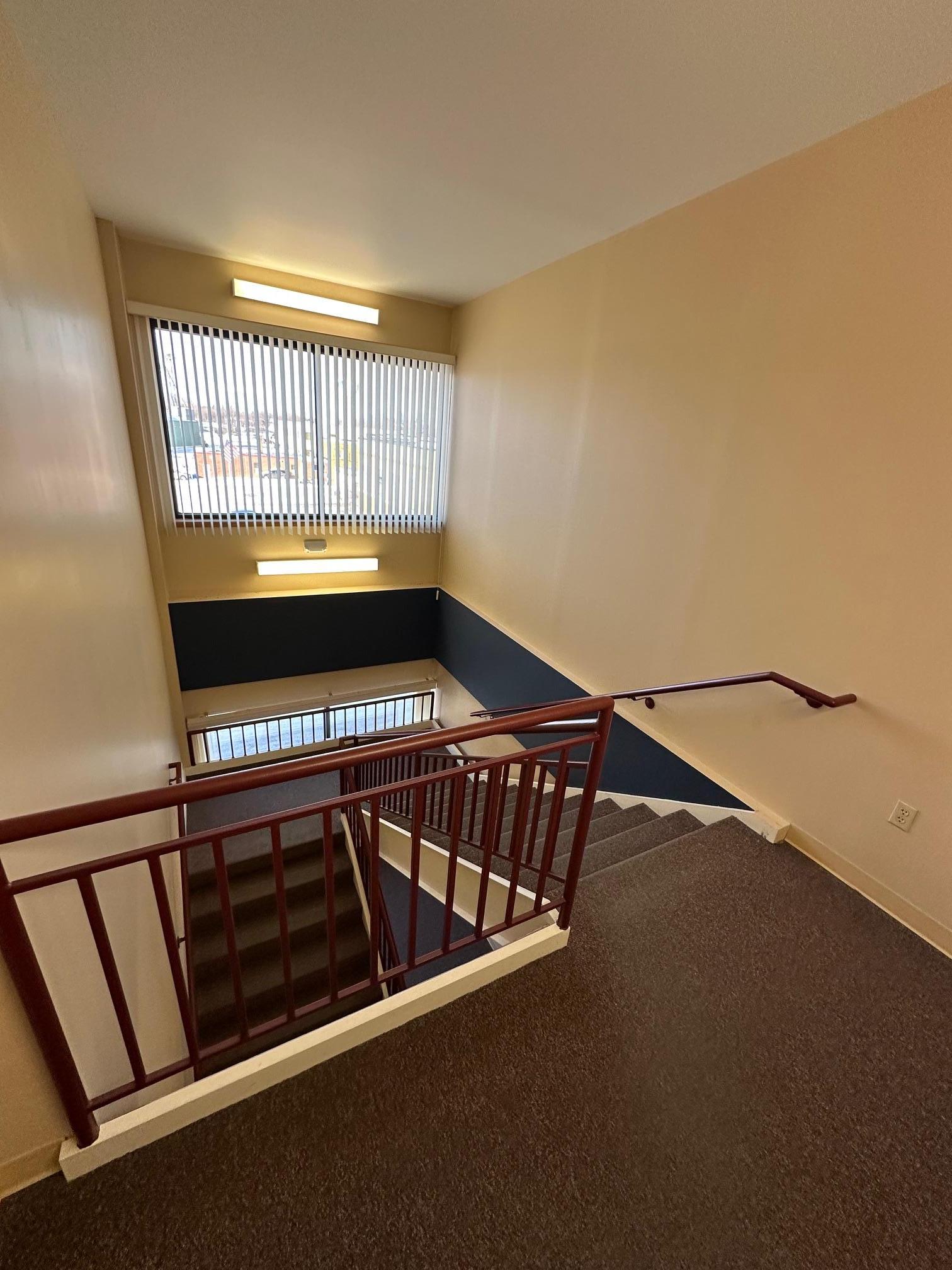 Light filled front stairway plus elevator