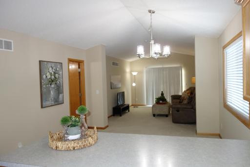 View from kitchen into dining and living room.