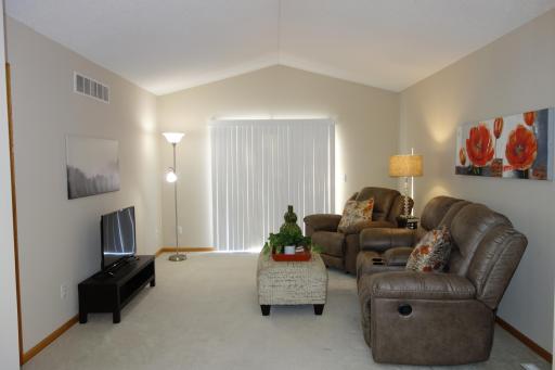 Living room walks out to rear yard with a patio door.