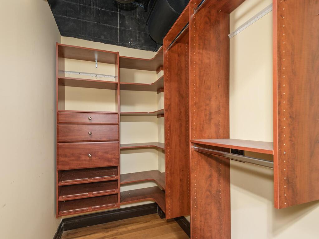 Walk in closet in the common area.