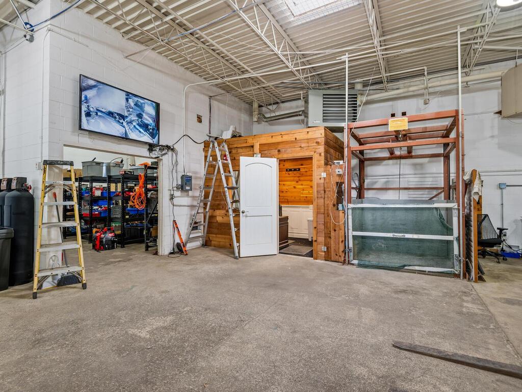 Main level private office, freight elevator and another storage area.
