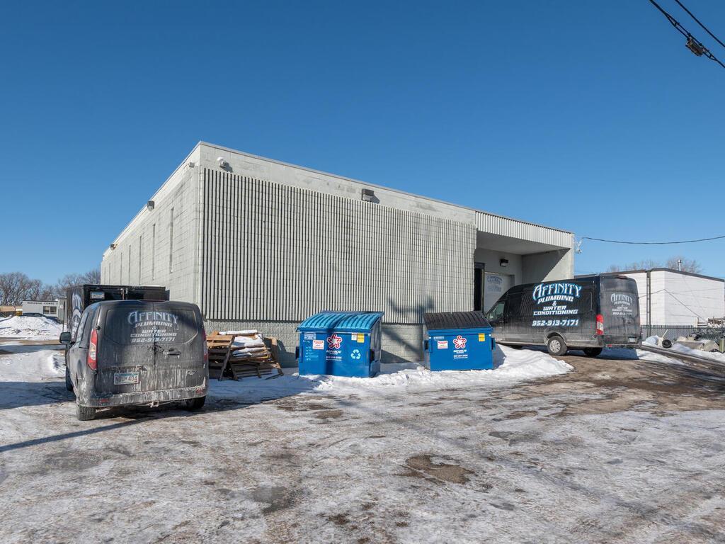 Side of building at the docking and load area just off the side alley.