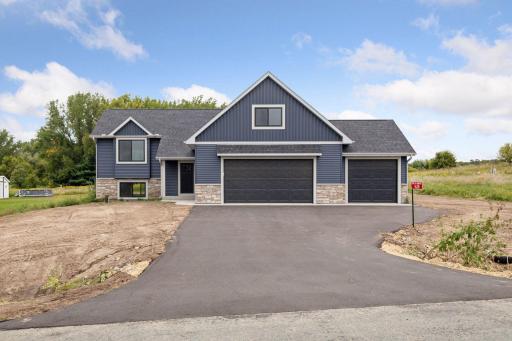 Photos are of a previously completed home with similar design and features. Actual selections, finishes, and materials may vary based on buyer choices and availability.