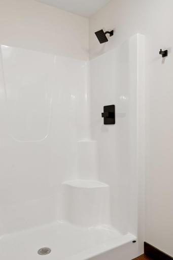 Photos are of a previously completed home with similar design and features. Actual selections, finishes, and materials may vary based on buyer choices and availability.
