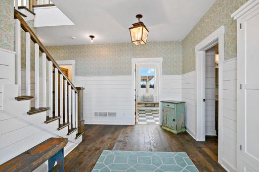 Real hardwood floors adjacent is the walk in pantry and mudroom.