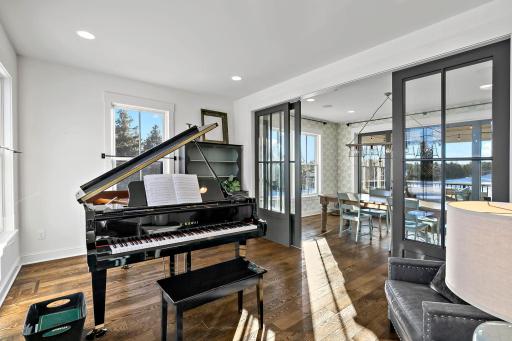 Parlour room perfect for the piano or a place to have some quiet reading time.