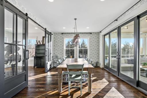 Large Dining area leads out to screen porch.