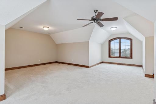 Upper level bonus room with plenty of room for games, pool table, or extra storage