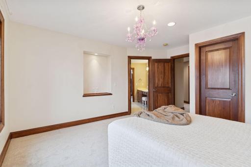 Fourth bedroom on the upper level with a walk-in closet and access to the Jack and Jill full bathroom