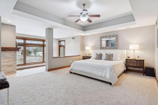 Head to the upper level to discover the luxurious primary suite