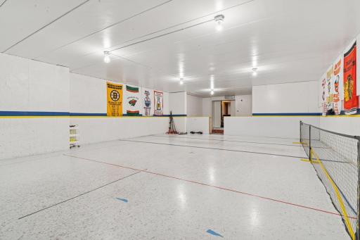 Expansive lower-level sport courtâperfect for year-round play, practice, and recreation