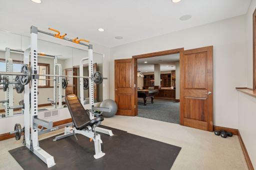 Mirrored wall and plenty of space for gym equipment