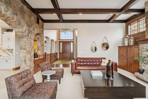 Beamed, high ceilings create dimension in the living room