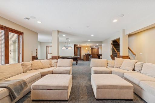 Lower level family room offers plenty of space for seating