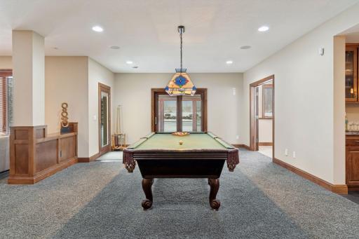 Easily access the lower level sun room, exercise room, and wet bar.